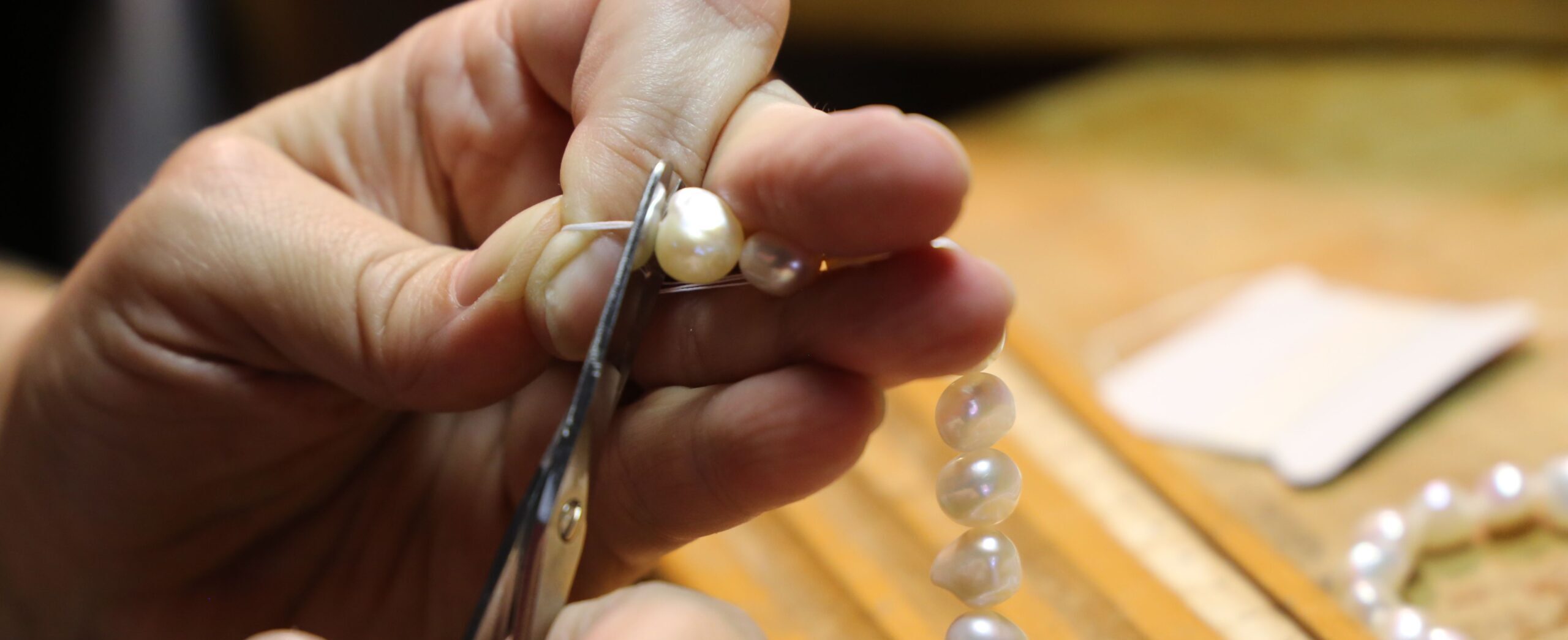 Pearl jewellery threading and hanging at BAJ