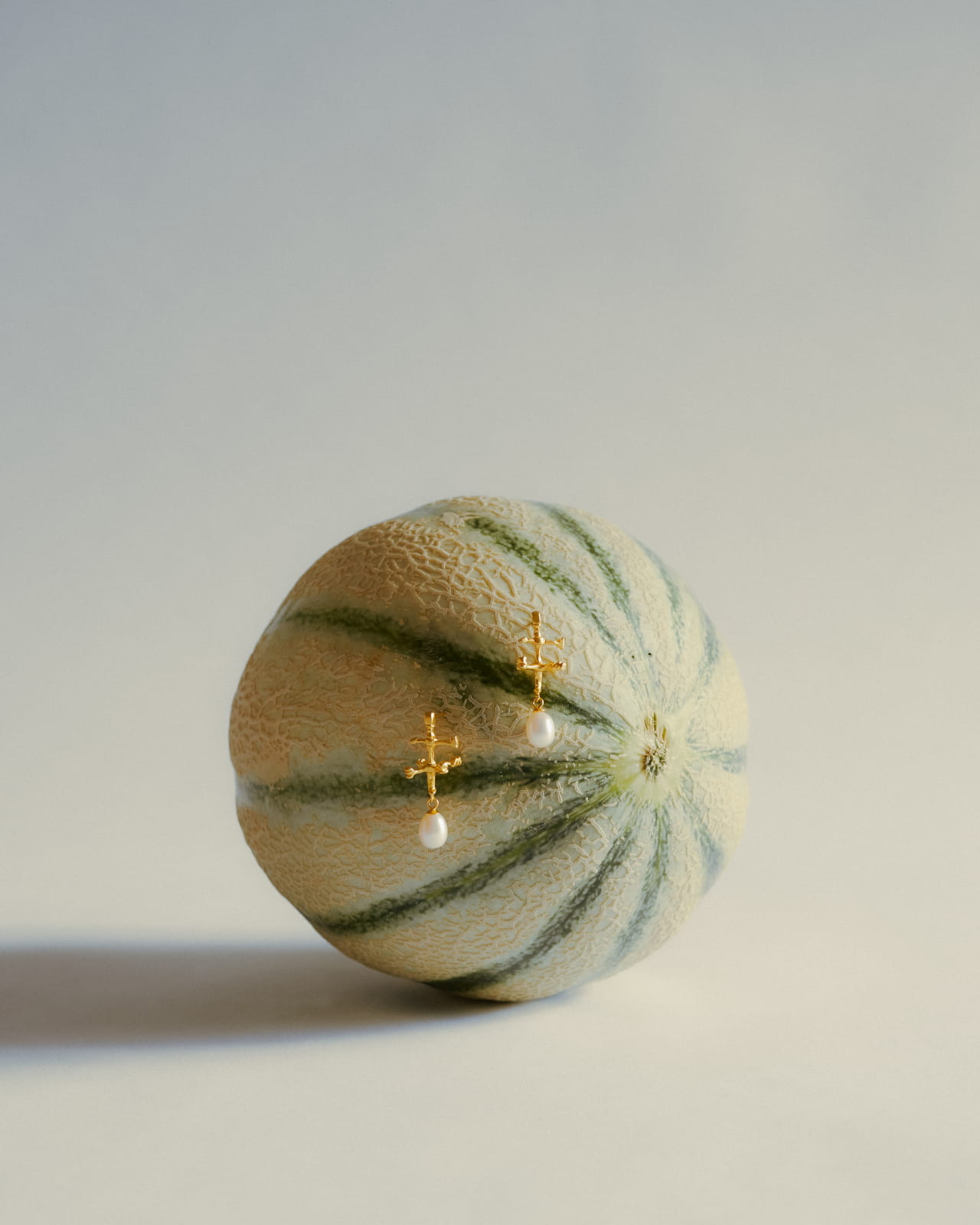 Image_Alumni work_Selina Mingjie_2025 collection_golden earrings_melon_pearls_still life_2025-07-30